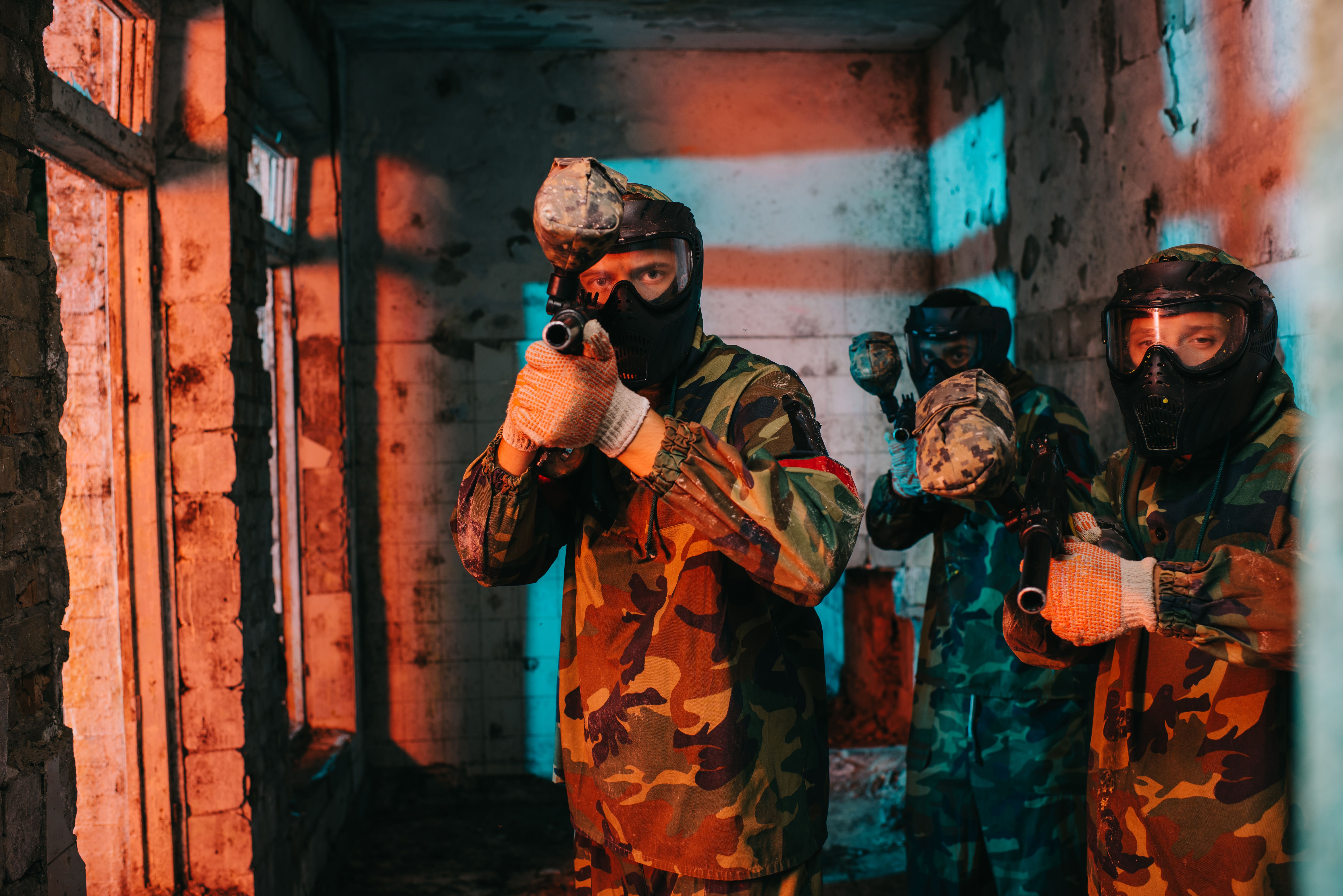paintball-team-in-uniform-and-protective-masks-aim-2024-11-15-16-57-33-utc.jpg